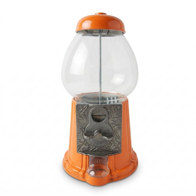 Bright, fun, and nostalgic, this vintage Jolly Good gumball machine features a bold orange metal base and classic cast...