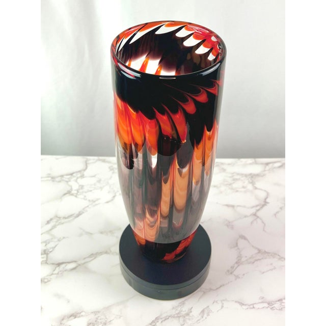 A magnificent Mid-Century Modern Italian cased art glass vase attributed to Fratelli Toso, crafted in Murano, Italy....
