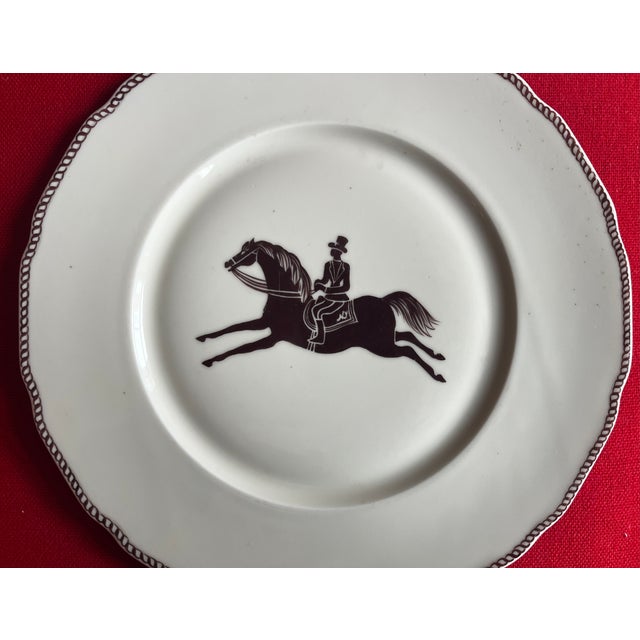 Large French Paris porcelain Art Deco charger plate decorated with an equestrian theme of horse and rider in the manner of...