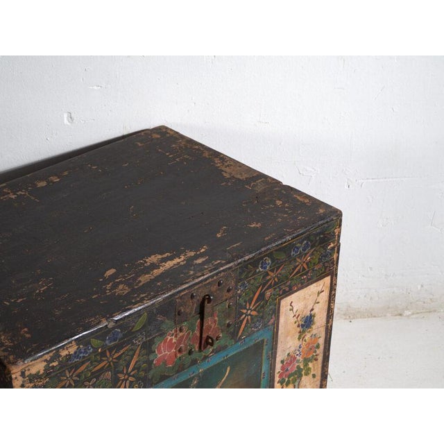 Antique painted chinese trunk in pine wood, provincial painted furniture with polychrome composition originating from...