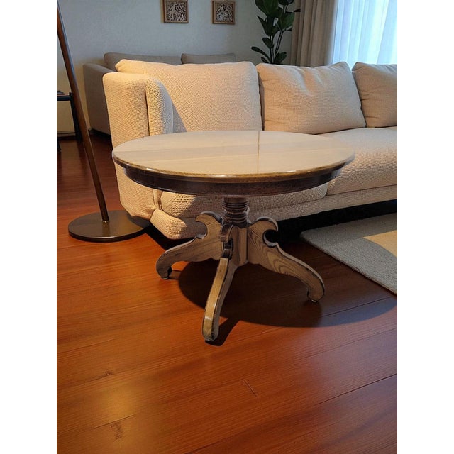 This solid oak pedestal side table reflects the enduring appeal of the Mission and Arts and Crafts styles, popular in the...