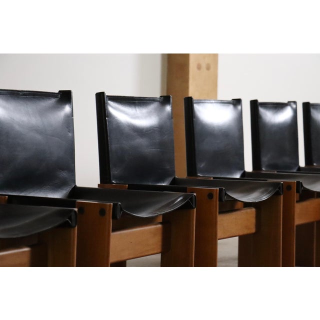 Fantastic set of 6 ‘monk’ chairs in black leather, designed by the renowned duo afra and tobia scarpa for molteni in...