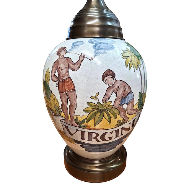 On offer are a pair of 20th-century lamps made from antique Dutch Delftware tobacco jars. Such containers were originally...