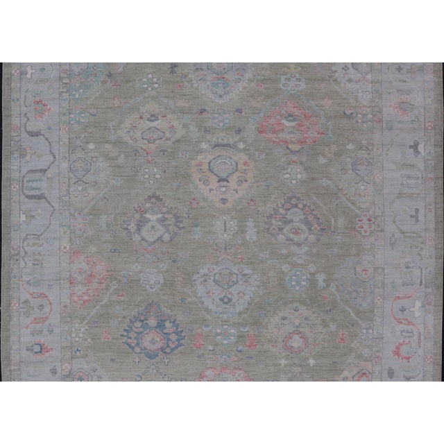 Measures: 9'1 x 12'0 Keivan Woven Arts Hand-Knotted Transitional Neutral Oushak Rug. Keivan Woven Arts; rug AWR-378 /...