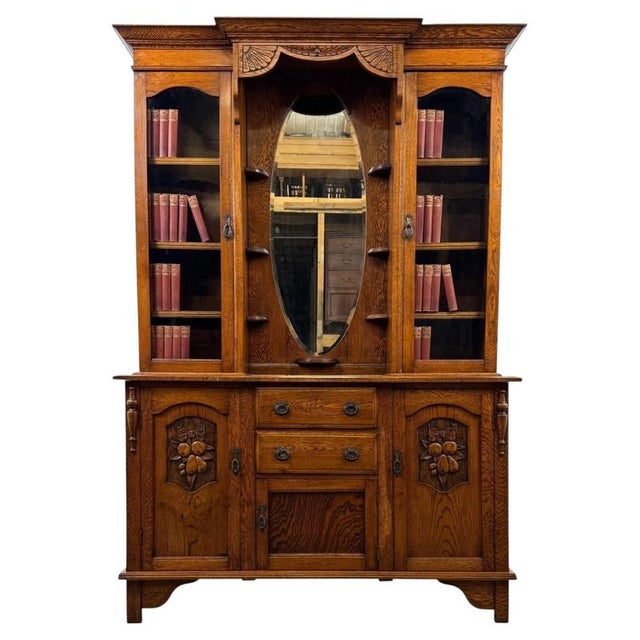 An exceptional early 20th-century dresser in the Art Nouveau style, finely crafted from oak and distinguished by its...