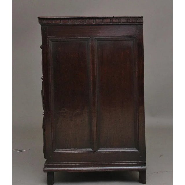 Early 18th Century oak moulded front chest of drawers from the Stuart period, the rectangular top with a decorative carved...
