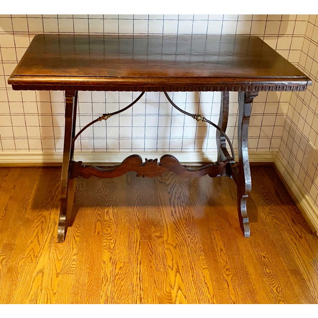 An 18th century Italian walnut table with metal. Circa 1780 - 1790