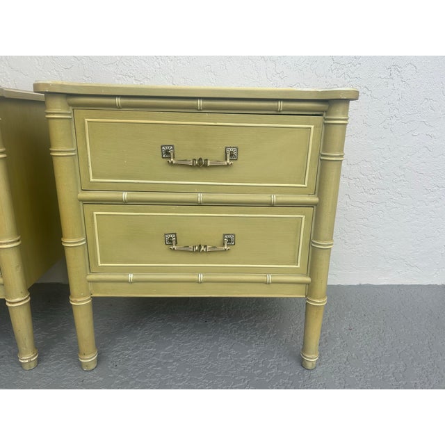 Vintage Faux Bamboo 2 Drawer nightstands from the 1960’s. Henry Links Bai Hai collection solid wood construction with...