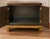 Striking 1970s Hollywood Regency cabinet by Baker Furniture, combining Asian Modern styling with the glamorous brass...