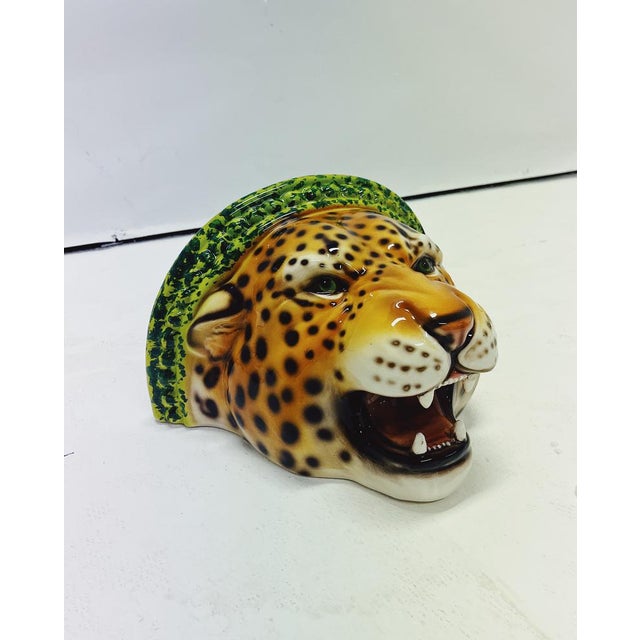 Unique handmade statue of a leopard. This Hollywood Regency statue, crafted from hand-painted ceramic and made in Italy,...