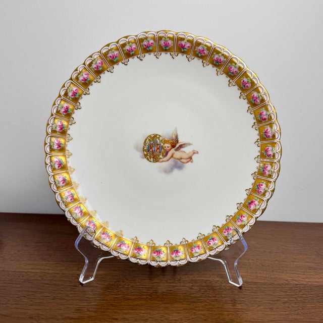 Antique Victorian porcelain cabinet plate manufactured by Worcester and retailed by Phillips, a prominent 19th-century...