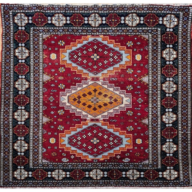 3’ 10” x 3’ 10” Highly desirable square size Persian tribal area rug in a brilliant red background color with medallions...