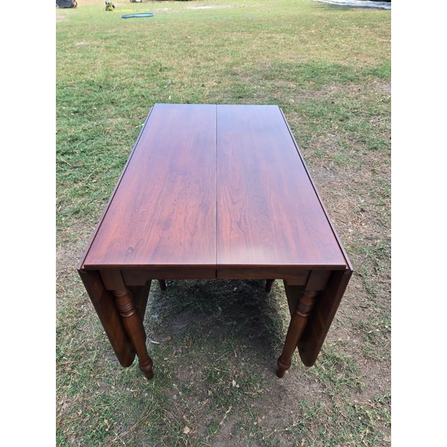 This table is in great condition and ready to be used! It has very few marks from use and is made from solid cherry....