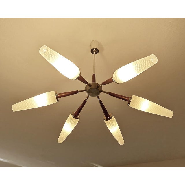 Large Vintage Sputnik pendant light, featuring 6 spokes with wood trim, opaline glass shades with a light pinstripe...