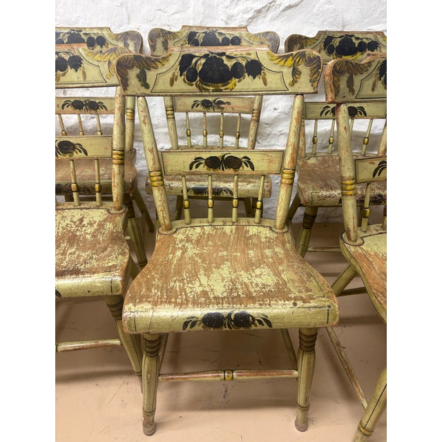 6 asparagus green chairs with black and green detailing Original distressed paint 19th century Hitchcock style chairs Also...