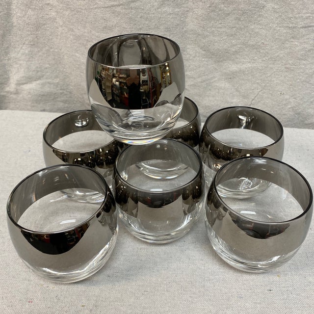 Beautiful mirror thick banded silver roly poly cocktail glasses. Set of 7. One glass has slight silver loss. Great set!