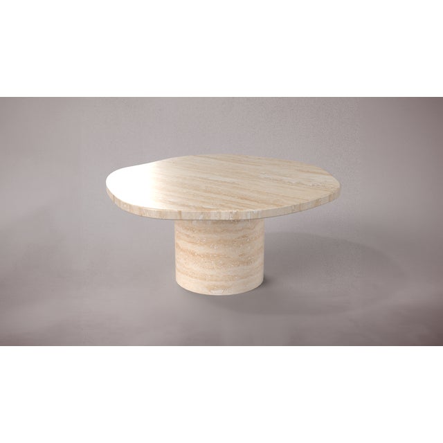 Introducing our versatile travertine coffee table, a seamless blend of natural beauty and modern design. Crafted with...