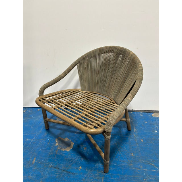 Stylish Baker McGuire Crescent Lounge Chair. Taupe with hint of green stringed body. No cushion, as is. Factory finish....