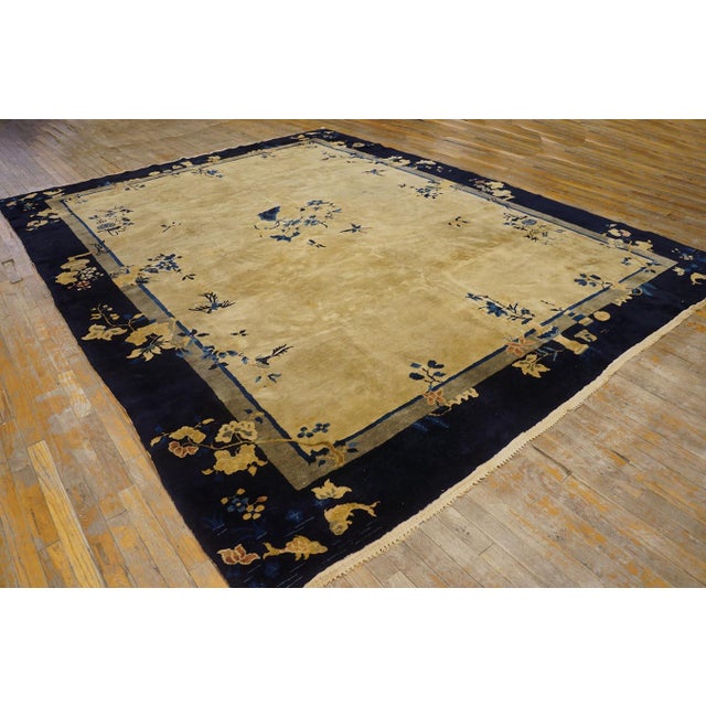 Antique Peking Room Size Wool Black, Ivory Beige Cream White Rug, Circa Date: 1920s. This exquisite Chinese textile...