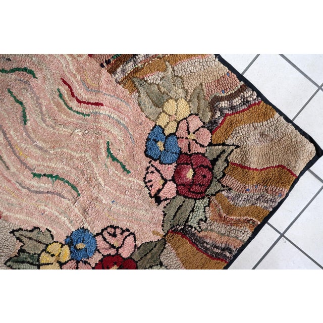 Handmade antique American Hooked rug in abstract design. The rug is from the end of 19th century. It is in good condition,...