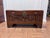 A charming, compact Hong Kong camphor chest from around the 1950s. It's deeply carved on all four sides and the lid, with...