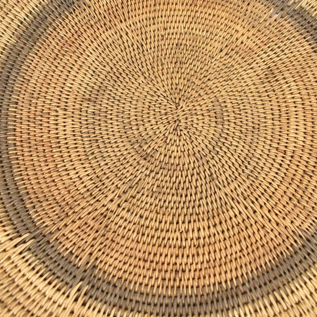 Handwoven Makenge flat wedding basket handmade by the Mbundu women within Zambia. These baskets are traditionally made...
