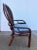This is a stunning Boho bentwood rattan and cane chair. It features gorgeous dark rattan wood and a removable blue and...