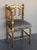 A charming pair of French Provincial gilded wood corner chairs. Beautifully carved walnut frames and new upholtered seats,...