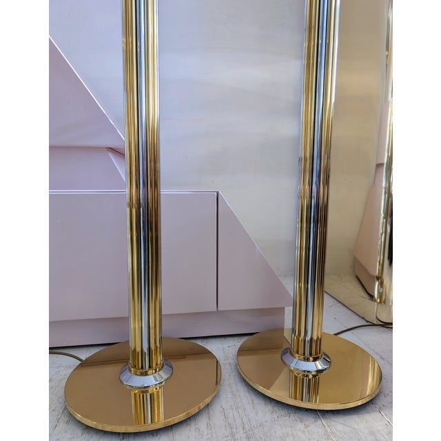 Pair of gorgeous & excellent quality gold & chrome floor lamps, by baulmann leuchten, germany, 1980s. a cluster of gold &...