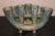 A really beautifully glazed candle holder out of a collection of wonderful art pottery. It has a collection sticker on...