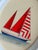 A striking sailboat painting, hand-painted by master artists using acrylic paints and natural pigments. This piece stands...