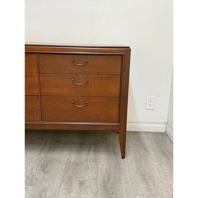 Beautiful mid century modern walnut dresser manufactured by Century Furniture, professionally restored.