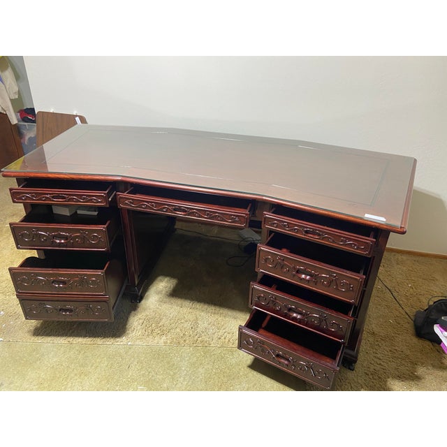 Elevate your home or office with this magnificent Oriental hardwood pedestal desk, a true testament to timeless design and...