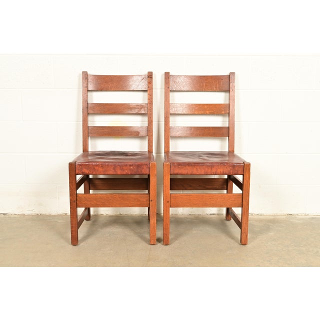 An exceptional pair of antique Mission or Arts & Crafts period ladder back dining chairs By L. & J.G. Stickley USA, Circa...