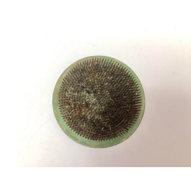 Floral Holder Frog Large Spiked Vogue No 7 Green Metal. 6 inches in diameter by 1 inch tall.. It is in good old vintage...