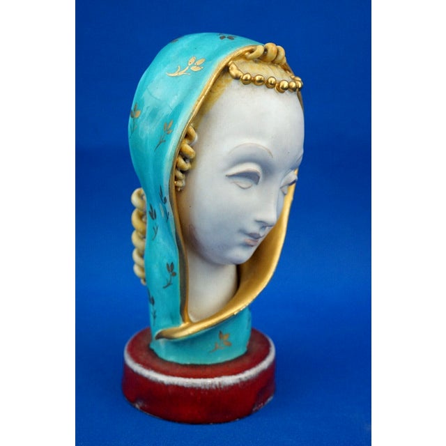 Fabulous bust of the madonna, entirely handcrafted without a mold in majolica ceramic, glazed with lead-rich enamels,...