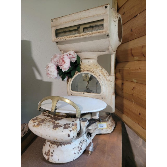 Antique butcher's scale with beautiful rusted patina. This is a heavy piece. Beautiful farmhouse statement.