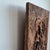 - Hand-carved wood panel - Jacobean style relief - Metal hanging bracket on back
