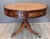 Early 19th C English mahogany drum table, the circular top inset with tan leather within a gilt-tooled border, the frieze...
