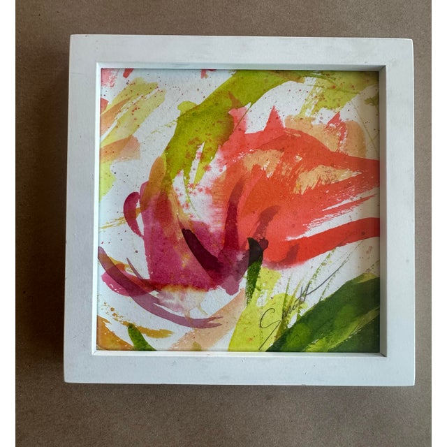 A bold and expressive original watercolor bursting with warm tones of coral, red, pink, and fresh green. The sweeping,...