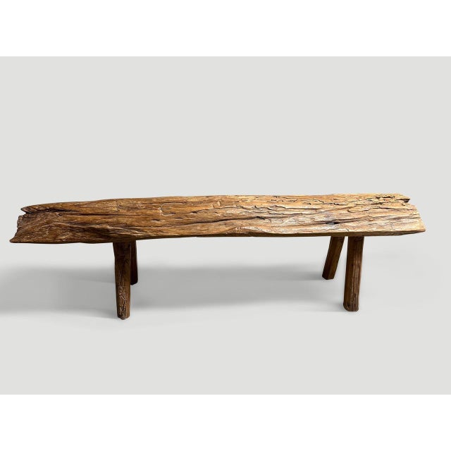 Beautiful bench hand made from a single thick 80 year teak log with lovely patina. Both usable and sculptural. This bench...
