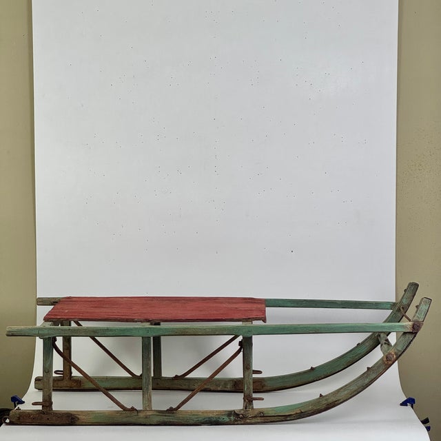 We have a rare and unique one on our hands. A Mid-Late 19th Century full size sled, in a most gorgeous original green and...