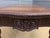 A bold and impressive carved mahogany writing table in the manner of Thomas Chippendale. Of generous proportions, made and...