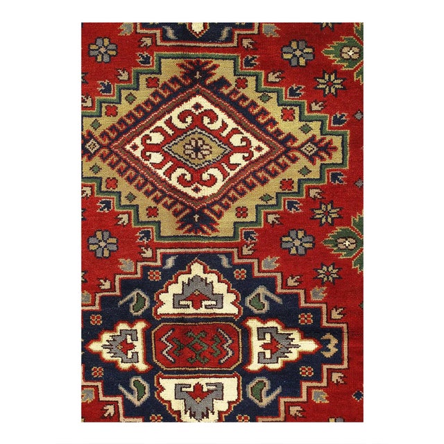 Beautiful Kazak rugs are characterized by their geometric designs. These Oriental rugs are newly-produced in Pakistan, and...