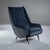 Pair of ISA Bergamo lounge chairs on forked brass legs, upholstered in blue velvet.