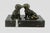 A charming vintage paperweight featuring two brass dachshunds mounted on a polished marble base. Crafted in Germany, this...