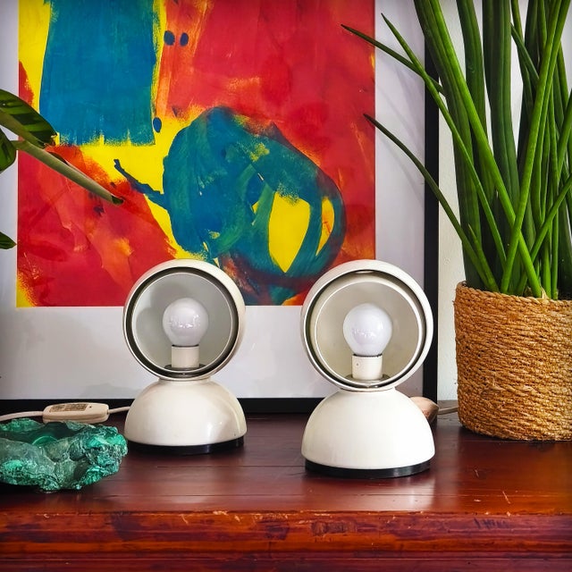 These white Eclisse lamps, emblematic of Italian design, were designed by Vico Magistretti in 1965 and produced by...