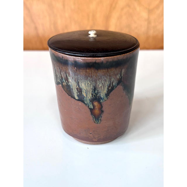 This small ceramic container from Edo period Japan circa 1800s was made in the Takatori Kilns in Fukuoka Prefecture. This...