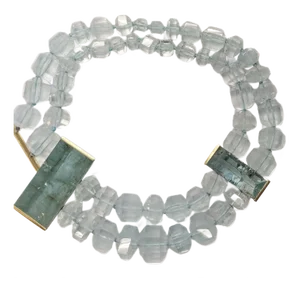 Aquamarine Hexagonal Crystals and Aquamarine Mirror Cut Clasp and Spacer Set in Yellow Gold.