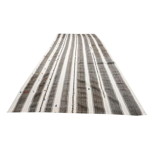 Large vintage handwoven kilim rug from Adana region of Turkey. Approximately 50-60 years old. In very good condition.